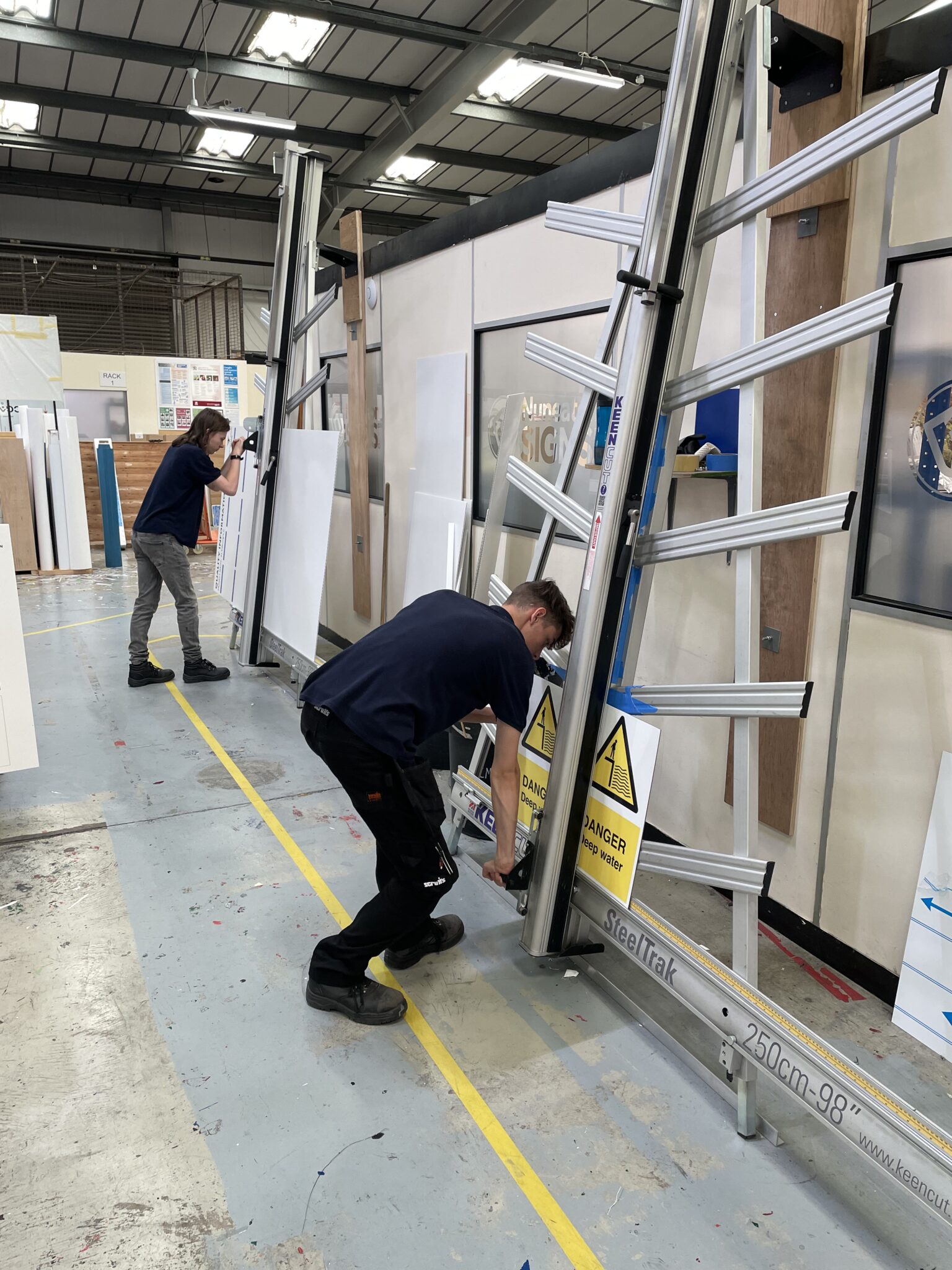Two SteelTrak machines being used in a production area
