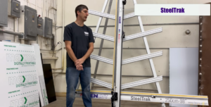 Josh standing next to his SteelTrak